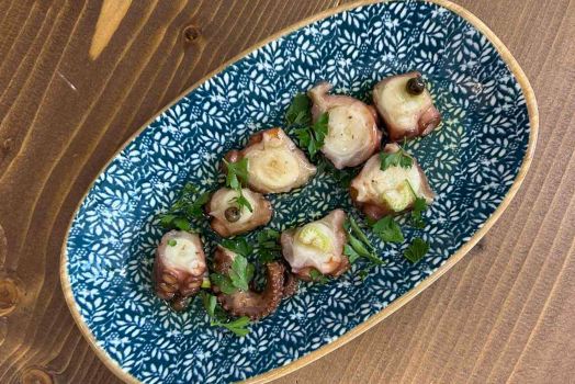 Chicken “tigania”  Fried chicken legs with honey, Florina pepper, feta cheese P.D.O. and fresh thyme